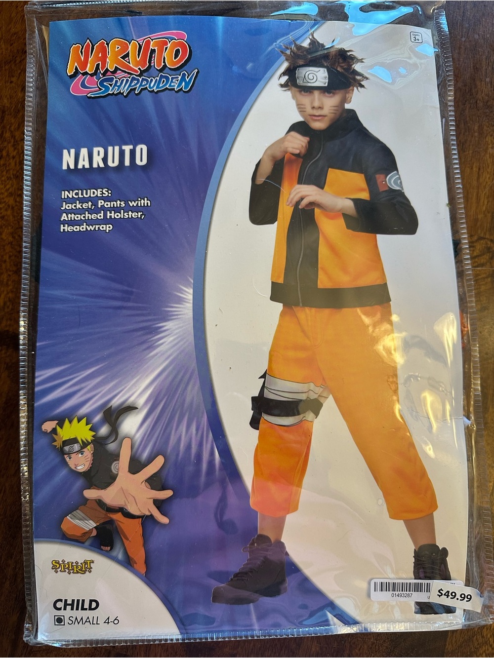 Naruto costume in original packaging. Perfect condition. Child size 4-6.